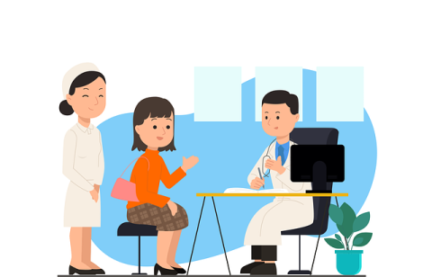 A woman talking to a doctor